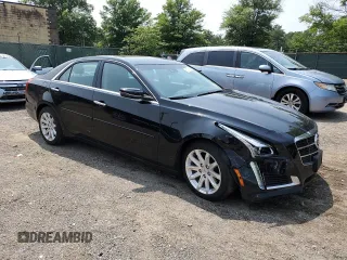 2014 Cadillac CTS Luxury AWD with VIN 1G6AX5SXXE0120681, listed as a Copart auction lot 60076655 with 99,552 mi miles and Salvage title. Bid and sale history available at DreamBid. Image 4.
