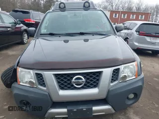 2014 Nissan Xterra X with VIN 5N1AN0NW5EN810488, listed as a IAAI auction lot 41705791 with 127,936 mi miles and . Bid and sale history available at DreamBid. Image 12.