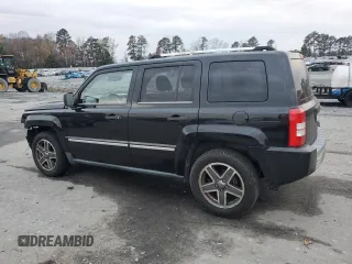 2008 Jeep Patriot Limited with VIN 1J8FT48W48D784052, listed as a Copart auction lot 84466004 with 124,667 mi miles and Salvage Title. Bid and sale history available at DreamBid. Image 2.