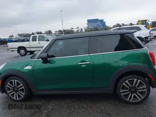 2020 MINI Hardtop Cooper S z VIN WMWXR5C08L2L85651, wystawiony jako IAAI lot #41521346 z przebiegiem 40 863 mil mil oraz . Historia ofert i sprzedaży dostępna na DreamBid. Obrazek 15.