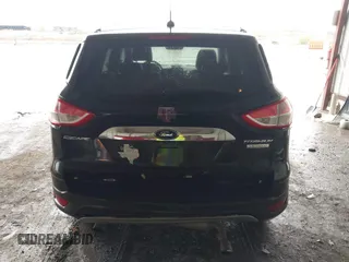 2014 Ford Escape Titanium z VIN 1FMCU0J96EUA84108, wystawiony jako IAAI lot #42114002 z przebiegiem 176 735 mil mil oraz . Historia ofert i sprzedaży dostępna na DreamBid. Obrazek 16.