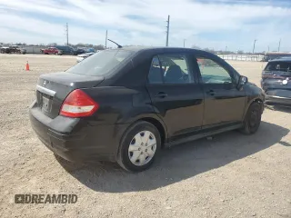 2010 Nissan Versa S with VIN 3N1BC1AP0AL409740, listed as a Copart auction lot 48996685 with 136,924 mi miles and Salvage Title. Bid and sale history available at DreamBid. Image 3.