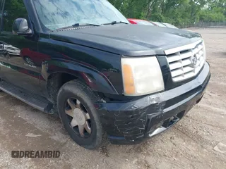 2002 Cadillac Escalade z VIN 1GYEK63N02R201402, wystawiony jako IAAI lot #42281859 z przebiegiem Nie podano mil oraz . Historia ofert i sprzedaży dostępna na DreamBid. Obrazek 6.