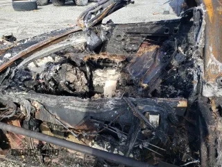 2002 Chevrolet Corvette with VIN 1G1YY22G225117384, listed as a Copart auction lot 77211944 with 0 mi miles and Salvage Title. Bid and sale history available at carsss.com. Image 7.