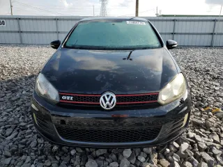 2012 Volkswagen GTI w/Conv & Sunroof z VIN WVWEV7AJ1CW090672, wystawiony jako Copart lot #71884774 z przebiegiem 116 996 mil mil oraz Szkoda całkowita • Salvage title. Historia ofert i sprzedaży dostępna na DreamBid. Obrazek 5.