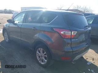 2017 Ford Escape SE with VIN 1FMCU0GD0HUB80123, listed as a IAAI auction lot 41895514 with 61,680 mi miles and . Bid and sale history available at DreamBid. Image 3.