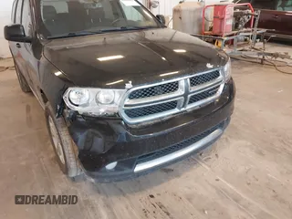 2013 Dodge Durango SXT with VIN 1C4RDJAG1DC681416, listed as a IAAI auction lot 42390313 with 222,022 mi miles and . Bid and sale history available at DreamBid. Image 6.