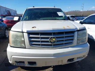 2005 Cadillac Escalade z VIN 1GYEK63N45R152595, wystawiony jako IAAI lot #41823123 z przebiegiem 163 157 mil mil oraz . Historia ofert i sprzedaży dostępna na DreamBid. Obrazek 13.