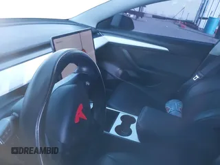 2022 Tesla Model 3 Performance z VIN 5YJ3E1EC7NF137744, wystawiony jako IAAI lot #41427701 z przebiegiem Nie podano mil oraz . Historia ofert i sprzedaży dostępna na DreamBid. Obrazek 7.