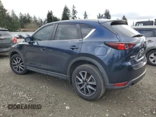 2018 Mazda CX-5 Touring with VIN JM3KFACM8J1349356, listed as a Copart auction lot 89154055 with 82,719 mi miles and Salvage Title. Bid and sale history available at carsss.com. Image 2.