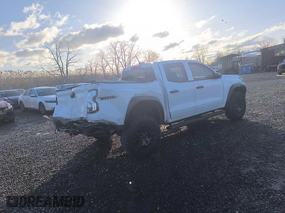 2023 Chevrolet Colorado 4WD Trail Boss with VIN 1GCPTEEK7P1181101, listed as a Copart auction lot 48180015 with 23,423 mi miles and Salvage Title. Bid and sale history available at carsss.com. Image 4.