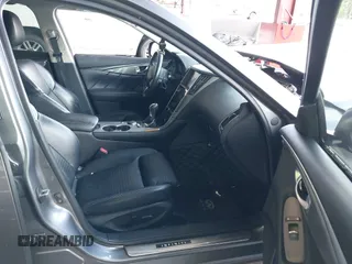 2015 Infiniti Q50 Premium z VIN JN1BV7AR3FM422042, wystawiony jako IAAI lot #42258784 z przebiegiem 72 030 mil mil oraz . Historia ofert i sprzedaży dostępna na DreamBid. Obrazek 5.