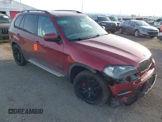 2011 BMW X5 35i with VIN 5UXZV4C52BL412895, listed as a IAAI auction lot 41835748 with 127,567 mi miles. Bid and sale history available at carsss.com. Image 1.