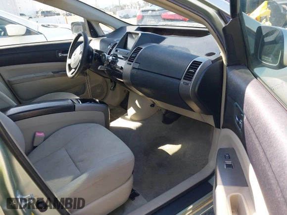 2007 Toyota Prius z VIN JTDKB20U877556527, wystawiony jako IAAI lot #41965245 z przebiegiem 259 572 mil mil oraz . Historia ofert i sprzedaży dostępna na DreamBid. Obrazek 5.