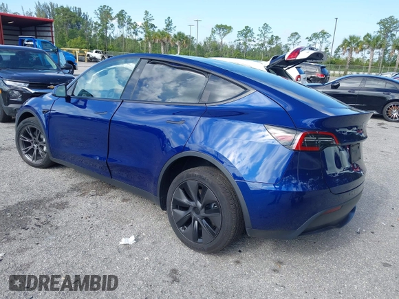 2025 Tesla Model Y Long Range z VIN 7SAYGDED0SF256650, wystawiony jako IAAI lot #41993206 z przebiegiem Nie podano mil oraz . Historia ofert i sprzedaży dostępna na DreamBid. Obrazek 3.