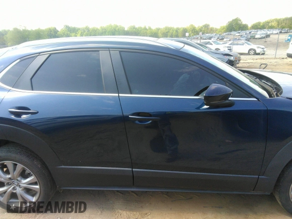 2022 Mazda CX-30 S Carbon Edition with VIN 3MVDMBCL6NM423255, listed as a IAAI auction lot 42209829 with 51,589 mi miles and . Bid and sale history available at DreamBid. Image 13.
