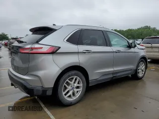 2021 Ford Edge SEL с VIN 2FMPK4J92MBA11014, выставлен на аукционе Copart как лот 61131095 с пробегом 64 316 миль миль и Списание • Salvage title. История ставок и продаж доступна на DreamBid. Изображение 3.