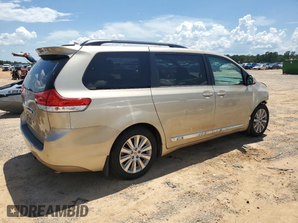 2014 Toyota Sienna XLE with VIN 5TDYK3DC8ES414814, listed as a Copart auction lot 64577875 with 111,675 mi miles and Salvage title. Bid and sale history available at DreamBid. Image 3.