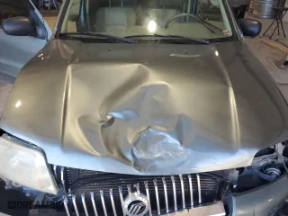 2006 Mercury Mariner Luxury with VIN 4M2YU561X6DJ01708, listed as a Copart auction lot 89174475 with 197,106 mi miles and Salvage Title. Bid and sale history available at carsss.com. Image 12.