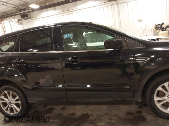 2017 Ford Escape SE with VIN 1FMCU9G94HUE08060, listed as a IAAI auction lot 41856229 with 187,838 mi miles and . Bid and sale history available at carsss.com. Image 14.