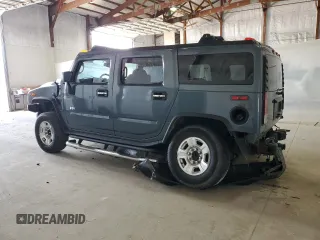 2005 Hummer H2 SUV z VIN 5GRGN23U65H127711, wystawiony jako Copart lot #53180865 z przebiegiem 178 085 mil mil oraz Szkody całkowita. Historia ofert i sprzedaży dostępna na DreamBid. Obrazek 2.