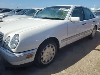 1996 Mercedes-Benz E Class with VIN WDBJF20F1TJ019480, listed as a Copart auction lot 76764114 with 0 mi miles and Salvage Title. Bid and sale history available at carsss.com. Image 1.