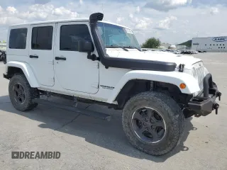 2015 Jeep Wrangler Unlimited Rubicon with VIN 1C4BJWFG8FL561308, listed as a Copart auction lot 60233385 with 208,224 mi miles and Clean title. Bid and sale history available at DreamBid. Image 4.