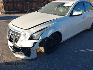 2014 Cadillac CTS Luxury AWD z VIN 1G6AX5SX3E0149360, wystawiony jako IAAI lot #41020479 z przebiegiem 98 917 mil mil oraz . Historia ofert i sprzedaży dostępna na DreamBid. Obrazek 6.