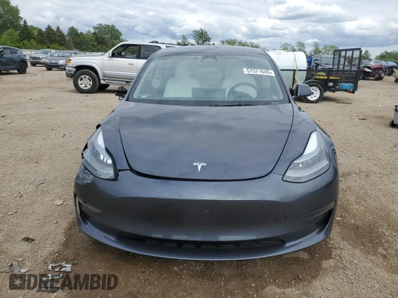 2023 Tesla Model 3 with VIN 5YJ3E1EA3PF672023, listed as a Copart auction lot 57571645 with 18,115 mi miles and Salvage title. Bid and sale history available at DreamBid. Image 5.
