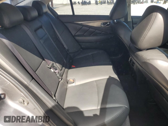 2017 Infiniti Q50 Premium z VIN JN1EV7AP4HM742288, wystawiony jako Copart lot #56983375 z przebiegiem 104 637 mil mil oraz Szkody całkowita. Historia ofert i sprzedaży dostępna na DreamBid. Obrazek 10.