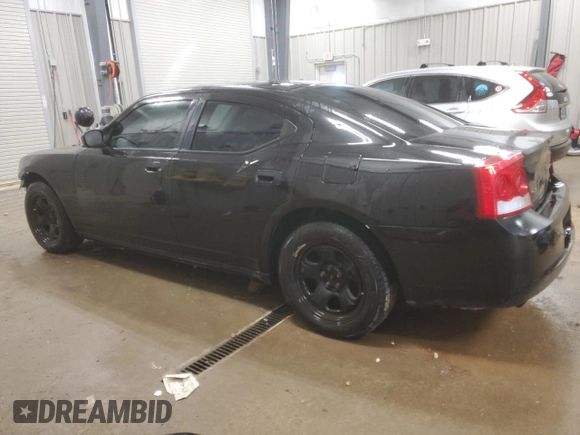2010 Dodge Charger Police with VIN 2B3AA4CTXAH228620, listed as a Copart auction lot 84744964 with 158,440 mi miles and Clean Title. Bid and sale history available at DreamBid. Image 2.