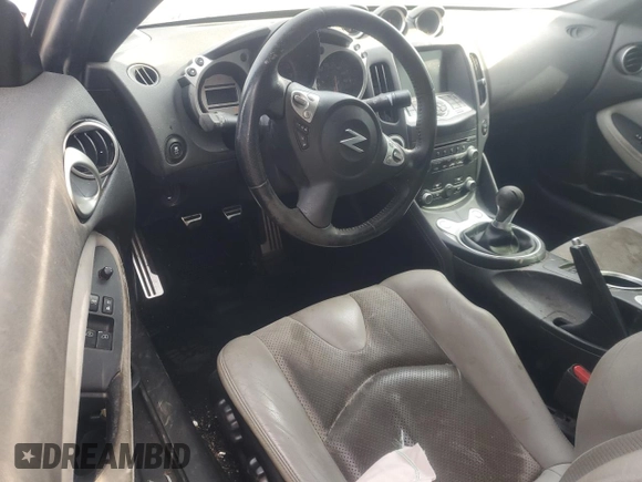 2012 Nissan 370Z с VIN JN1AZ4EH6CM562615, выставлен на аукционе Copart как лот 47623125 с пробегом 86 468 миль миль и Списание • Salvage title. История ставок и продаж доступна на DreamBid. Изображение 8.