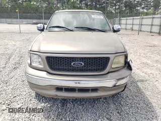 2002 Ford F-150 XLT with VIN 1FTRW07L12KA11845, listed as a Copart auction lot 51987205 with 282,865 mi miles and Salvage Title. Bid and sale history available at carsss.com. Image 5.