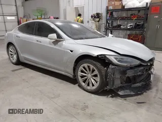 2017 Tesla Model S 100D z VIN 5YJSA1E23HF232059, wystawiony jako IAAI lot #41394046 z przebiegiem 84 052 mil mil oraz . Historia ofert i sprzedaży dostępna na DreamBid. Obrazek 1.