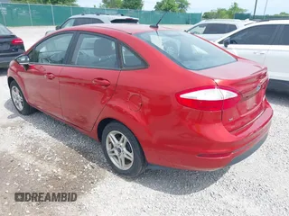 2018 Ford Fiesta SE z VIN 3FADP4BJ1JM132084, wystawiony jako IAAI lot #42296074 z przebiegiem 62 852 mil mil oraz . Historia ofert i sprzedaży dostępna na DreamBid. Obrazek 3.