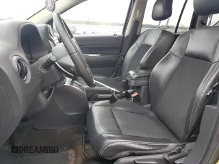 2014 Jeep Compass Latitude with VIN 1C4NJDEB4ED601769, listed as a Copart auction lot 48901365 with 129,826 mi miles and Salvage Title. Bid and sale history available at carsss.com. Image 7.
