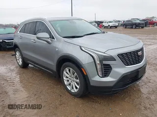 2023 Cadillac XT4 FWD Luxury with VIN 1GYAZAR49PF170591, listed as a IAAI auction lot 41283893 with 33,661 mi miles. Bid and sale history available at carsss.com. Image 1.