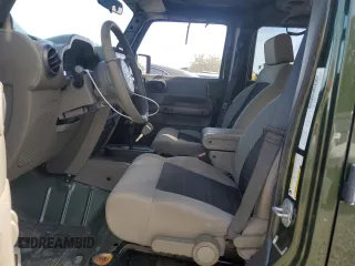 2008 Jeep Wrangler Unlimited X with VIN 1J4GB39108L608465, listed as a Copart auction lot 50949015 with 103,205 mi miles and Salvage Title. Bid and sale history available at DreamBid. Image 7.