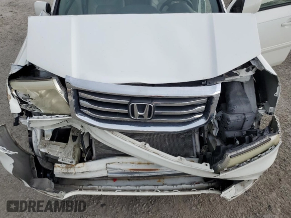 2013 Honda Pilot EX-L z VIN 5FNYF3H75DB025729, wystawiony jako Copart lot #56788345 z przebiegiem 177 448 mil mil oraz Szkoda całkowita • Salvage title. Historia ofert i sprzedaży dostępna na DreamBid. Obrazek 12.