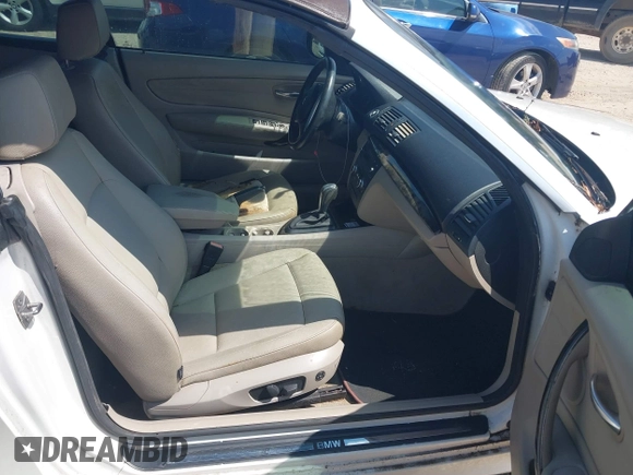 2011 BMW 1 Series 128i with VIN WBAUL7C50BVM81279, listed as a IAAI auction lot 42762091 with 193,062 mi miles and . Bid and sale history available at DreamBid. Image 5.