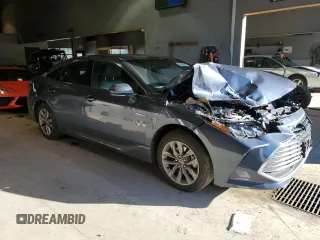 2020 Toyota Avalon Hybrid XLE z VIN 4T1A21FB7LU014807, wystawiony jako Copart lot #38368943 z przebiegiem 40 015 mil mil oraz . Historia ofert i sprzedaży dostępna na DreamBid. Obrazek 4.