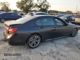 2018 BMW 7 Series 750i with VIN WBA7F0C5XJGM22674, listed as a Copart auction lot 74833524 with 0 mi miles and Salvage Title. Bid and sale history available at carsss.com. Image 3.