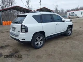 2016 Jeep Compass Latitude with VIN 1C4NJDEBXGD737018, listed as a IAAI auction lot 41800071 with 158,006 mi miles. Bid and sale history available at carsss.com. Image 4.