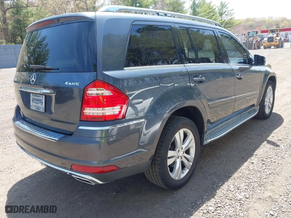 2011 Mercedes-Benz GL-Class GL 450 with VIN 4JGBF7BE9BA662497, listed as a IAAI auction lot 42102696 with 90,924 mi miles. Bid and sale history available at carsss.com. Image 4.