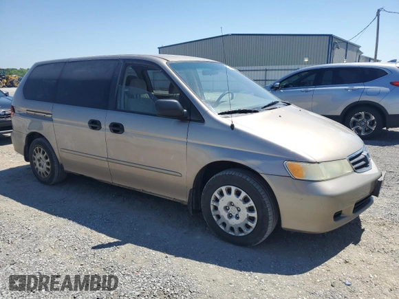 2004 Honda Odyssey LX with VIN 5FNRL18574B102634, listed as a Copart auction lot 54669075 with 141,057 mi miles and Salvage title. Bid and sale history available at DreamBid. Image 4.