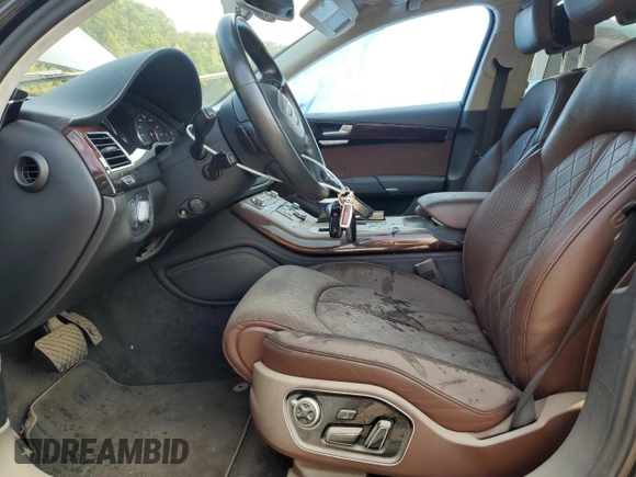2014 Audi A8 4.0T with VIN WAUR2AFD5EN003923, listed as a Copart auction lot 65389025 with 97,833 mi miles and Salvage title. Bid and sale history available at DreamBid. Image 7.