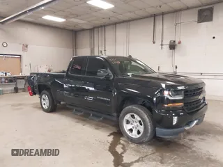 2017 Chevrolet Silverado 1500 LT with VIN 1GCVKREC0HZ384747, listed as a IAAI auction lot 37311343 with 67,390 mi miles. Bid and sale history available at carsss.com. Image 1.