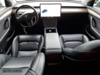 2023 Tesla Model 3 with VIN 5YJ3E1EA3PF450467, listed as a Copart auction lot 46667865 with 125,069 mi miles and Clean Title. Bid and sale history available at carsss.com. Image 8.