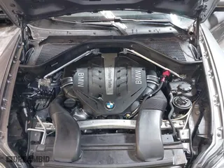 2014 BMW X6 50i with VIN 5UXFG8C55EL592995, listed as a IAAI auction lot 41724960 with 137,112 mi miles. Bid and sale history available at carsss.com. Image 10.