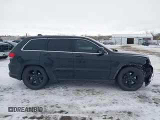 2016 Jeep Grand Cherokee Overland with VIN 1C4RJFCM5GC474718, listed as a IAAI auction lot 41307515 with 153,246 mi miles and . Bid and sale history available at DreamBid. Image 13.